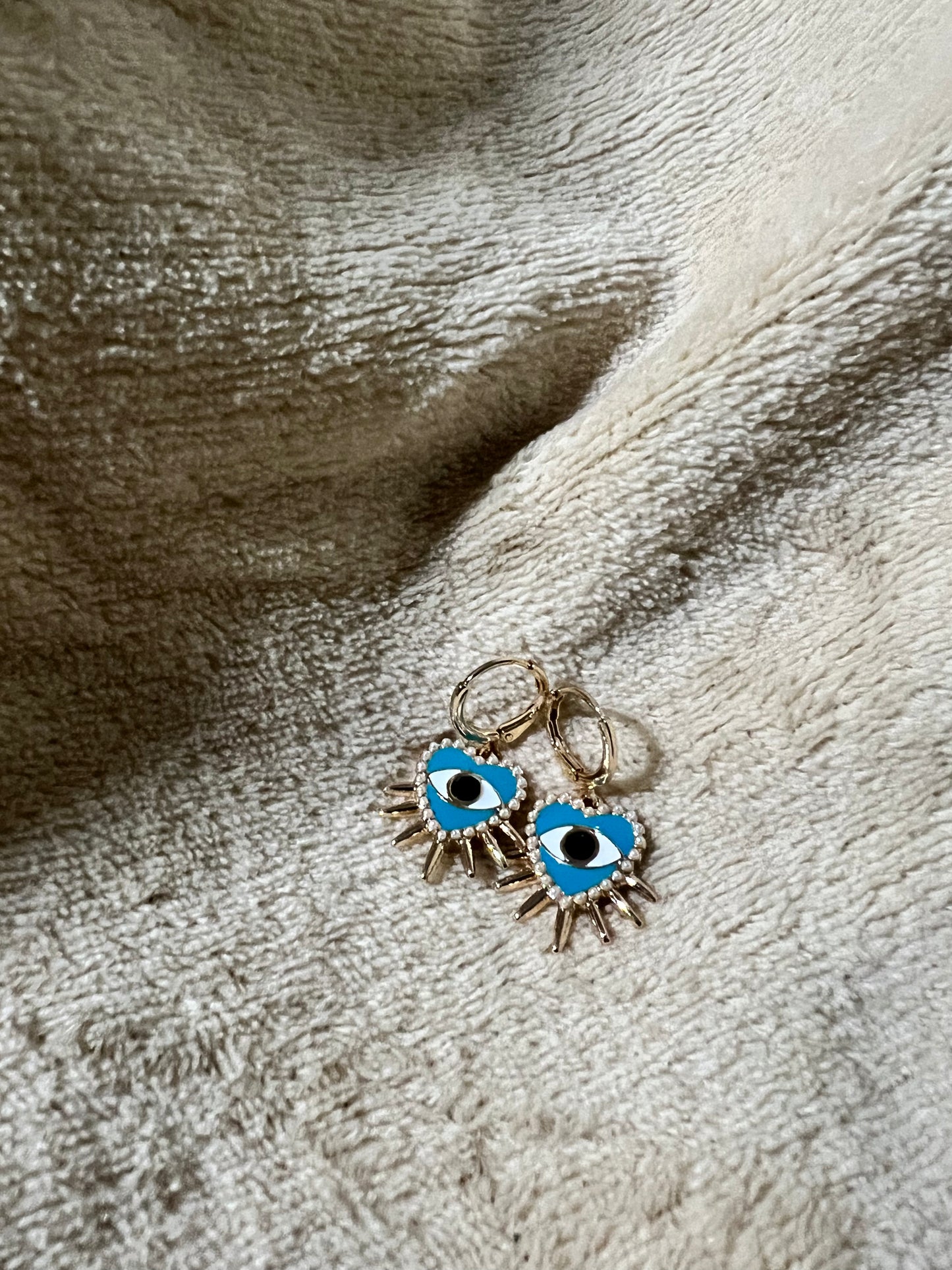 “EVIL EYE” spiked heart earrings