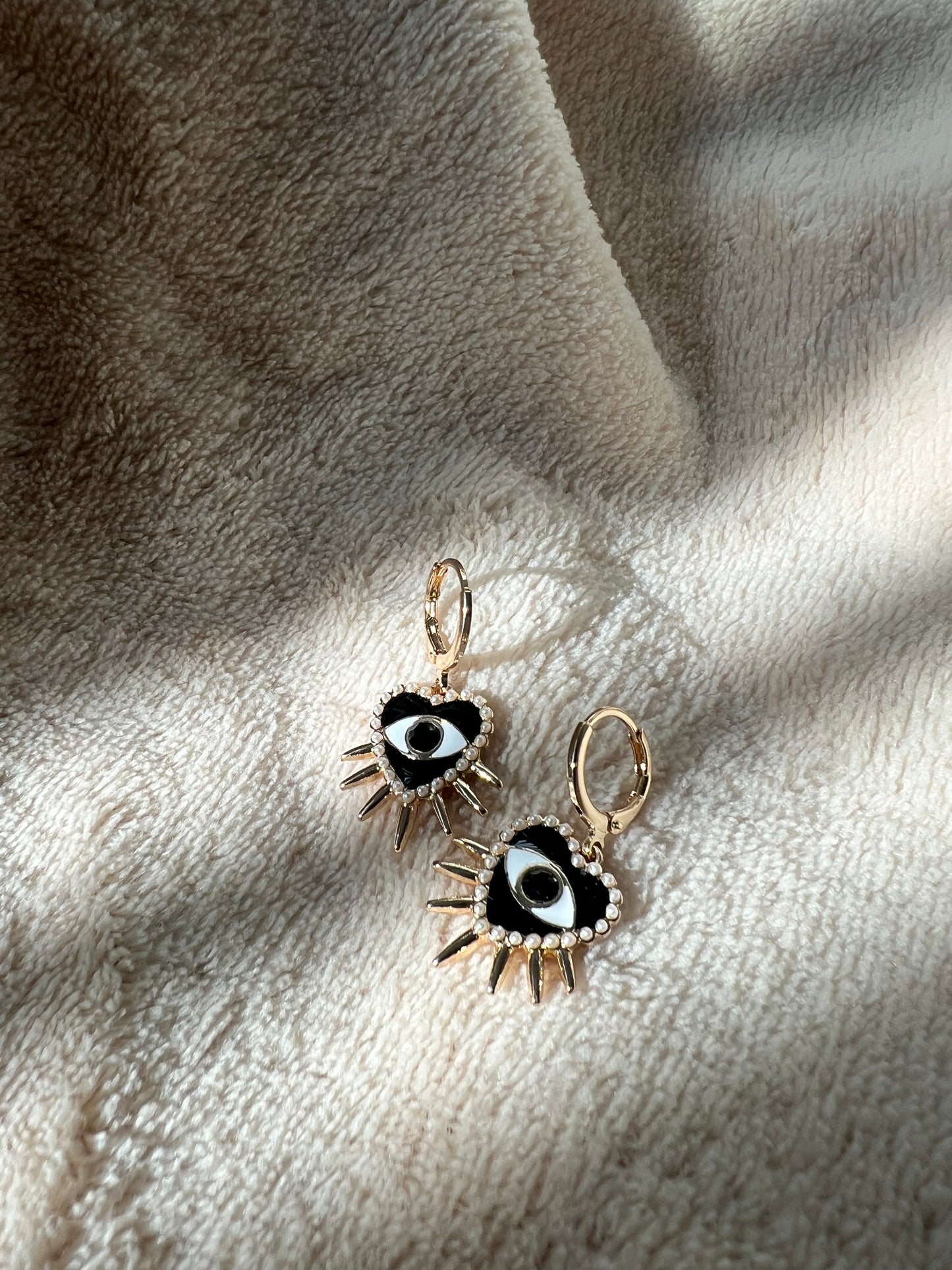 “EVIL EYE” spiked heart earrings